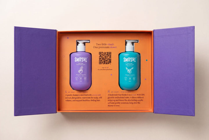 The SMUSH! gift box open, both magnetic doors swung out, with the Coconut Shampoo and Kokum Body Wash seated in the tray