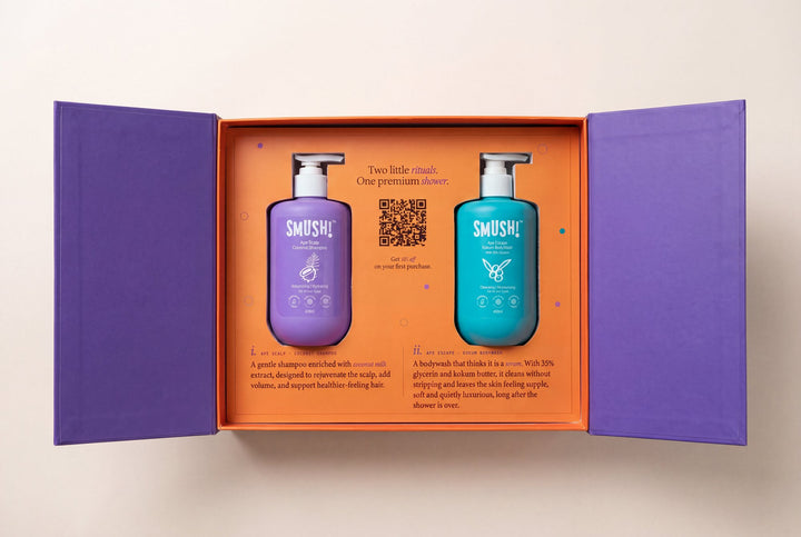 The SMUSH! gift box open, both magnetic doors swung out, with the Coconut Shampoo and Kokum Body Wash seated in the tray
