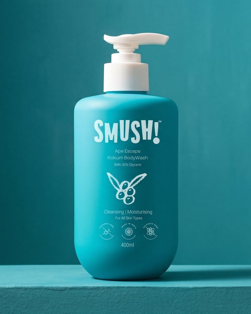 SMUSH! Ape Escape Kokum Body Wash, the teal 400 ml pump bottle, on a peacock-teal limewash ledge against a painted teal wall