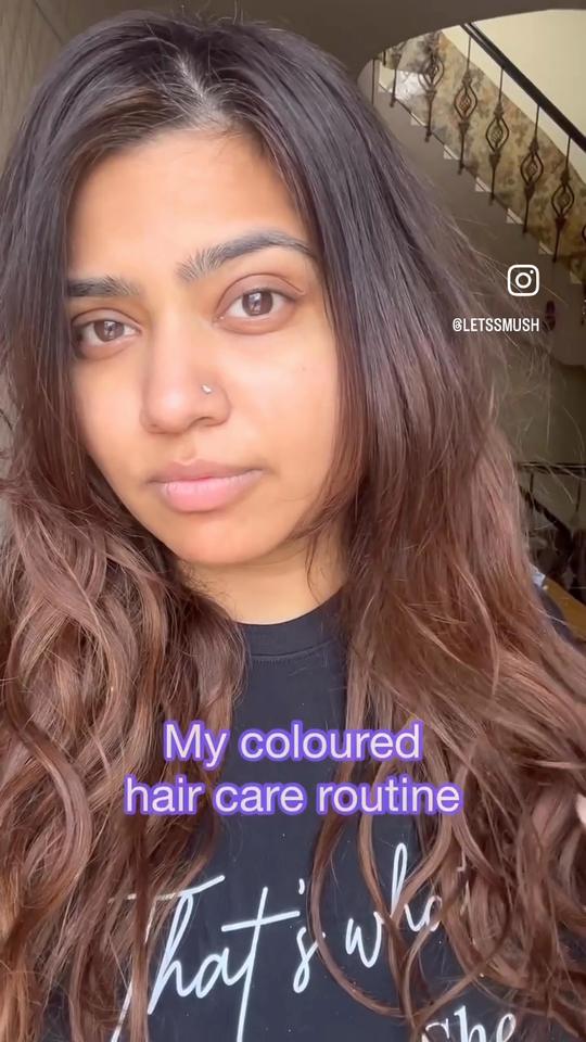 Video cover: A customer with coloured hair shows the Ape Scalp Coconut Shampoo in her wash routine